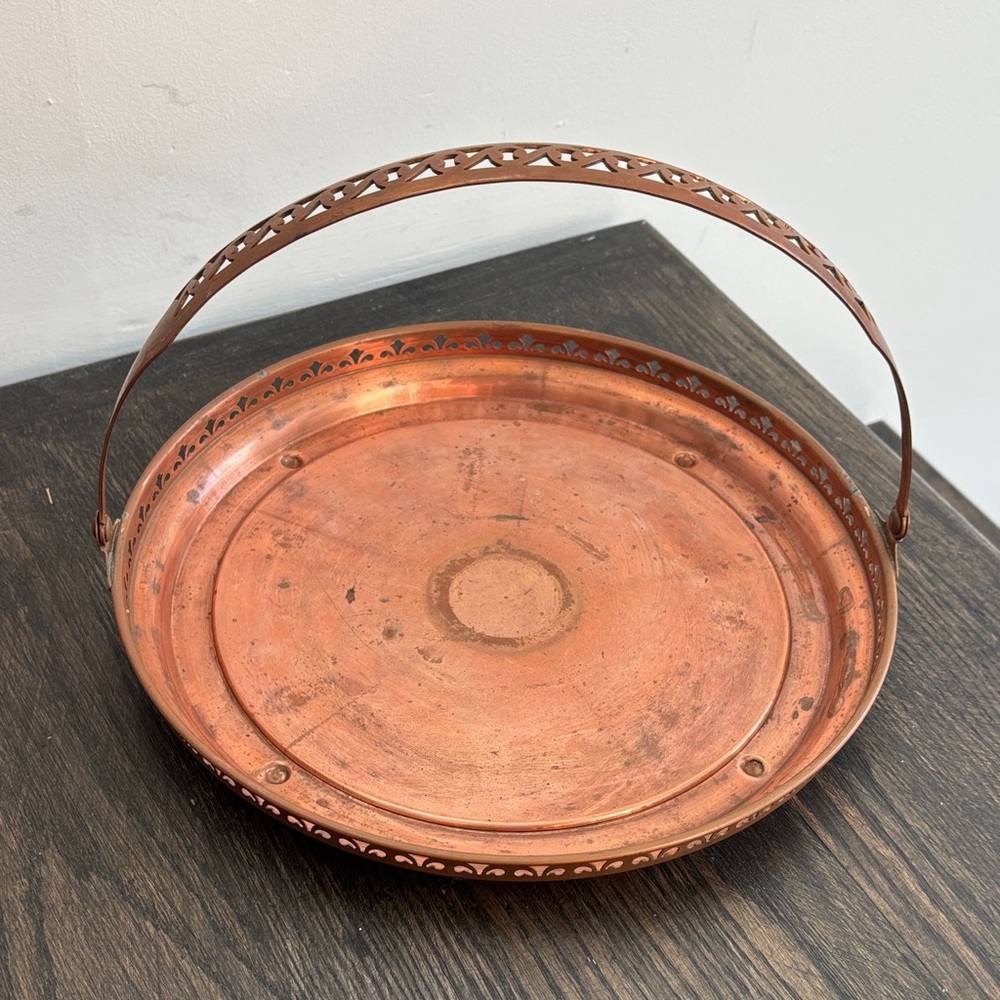 Vintage Empress ‘30s copper tray, handle, round,cut out design, 11”, 1” tall